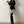 Black ribbed hooded bodysuit with polo collar and drawstring ties at the hips