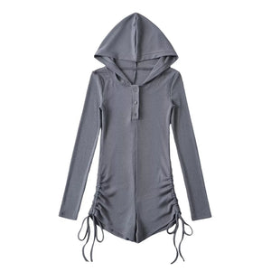 Black ribbed hooded bodysuit with polo collar and drawstring ties at the hips
