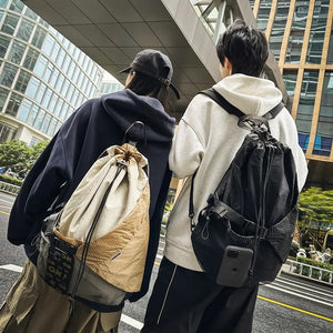 Beige and black drawstring techwear backpack, 20 to 35 litres