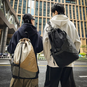 Beige and black drawstring techwear backpack, 20 to 35 litres