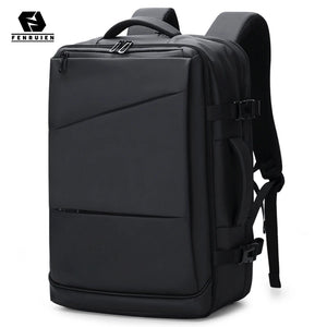 Black business backpack with an expandable main compartment and a luggage strap