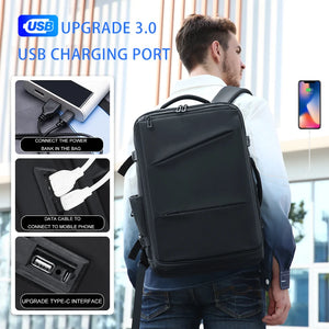 Black business backpack with an expandable main compartment and a luggage strap