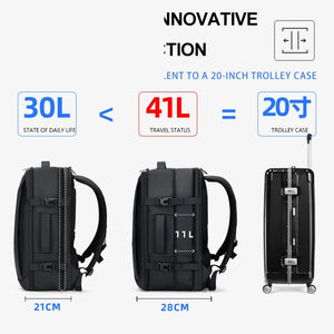 Black business backpack with an expandable main compartment and a luggage strap