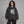 Eye Contact Graphic Y2K Hoodie – worn by a woman