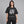 Faded Black Y2K Graphic T Shirt – worn by a woman