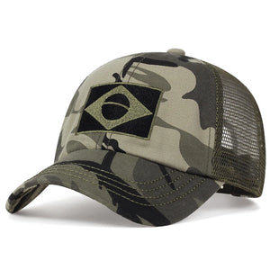 Camouflage trucker cap with an embroidered flag patch and mesh back