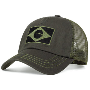 Camouflage trucker cap with an embroidered flag patch and mesh back
