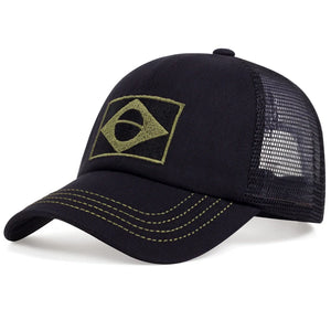 Camouflage trucker cap with an embroidered flag patch and mesh back