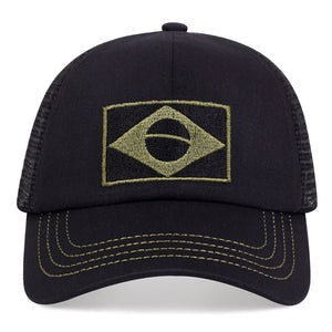 Camouflage trucker cap with an embroidered flag patch and mesh back