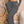 Dark Grey high waist cargo pants in front view, hand in pocket, flap pocket with hanging tie strap on the thigh