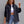 Smiling woman in the Black Frayed Denim Y2K Jacket, front view showing the buttoned flap chest pockets