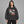 Funny Graphic Black Y2K Hoodie – worn by a woman