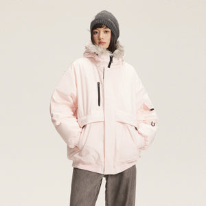 Woman in the Pink Fur Hood Parka Y2K Jacket, front view with hands in pockets and wide grey jeans