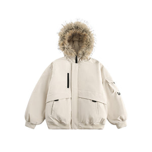 Apricot cream parka with a beige fur hood on a white background, front view of the chest zip pocket