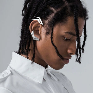 Silver geometric ear cuff that curves along the outer ear