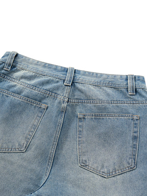 Close-up of the back yoke and patch pockets, with belt loops set along the mid-rise waistband