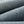 Folds of the washed denim laid over each other, showing the weight and thickness of the 470 gsm weave