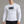 Goth Long Sleeve Compression Shirt on a man against a concrete wall, front view, black gothic print on white