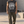 Goth Mask Y2K-tanktop i vasket sort, båret og set forfra i en betonggård