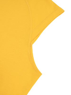 Armhole detail in yellow, showing the cut off raglan shoulder and the topstitched armhole edge