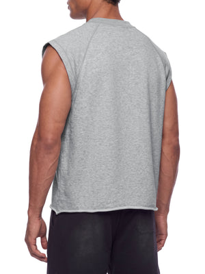 Back view on a male model, plain heather grey knit with raglan seams and wide open cut armholes