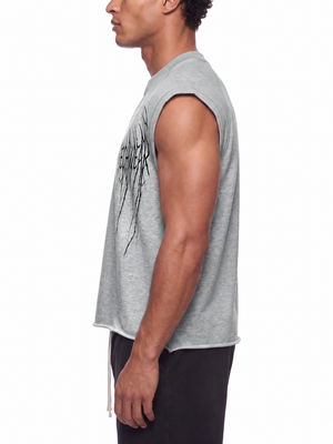 Side profile on a male model, heather grey sleeveless top, cut armhole and short square silhouette