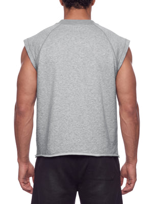 Model seen from behind in heather grey, ribbed collar sitting high and raw hem curving at the sides