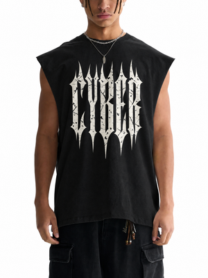 A model wears the black sleeveless tee, a spiked gothic wordmark printed across the chest