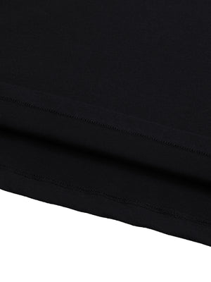 Close-up of the straight hem, stitched once and left flat against the washed cotton
