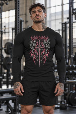 Front view on a man in a gym, the black compression shirt fitted over the chest and arms, with shorts