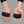Gym Four Finger Techwear Gloves worn by a person, close-up on both hands, front view on a grey studio background