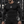 Gym Long Sleeve Compression Shirt on a man in a gym, front view, the shirt tight over chest and arms