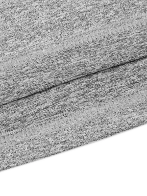 The heathered gray fabric twisted to show its high stretch, a 200 gsm polyester and spandex knit
