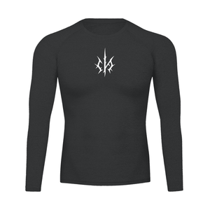 Black long sleeve compression shirt laid flat, front, small white spiked emblem centred on the chest