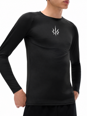 Closer front view on the model, the small spiked emblem on the chest and the round crew neck