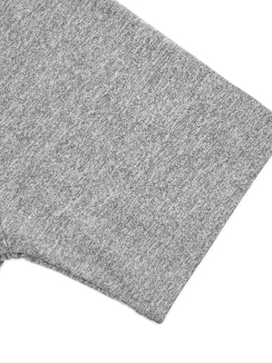 Detail of the short raglan sleeve hem on the Flecking Gray gym compression shirt, stitched edge