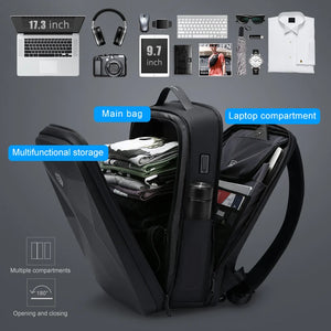 Black hardshell backpack with a moulded front panel and an external USB port