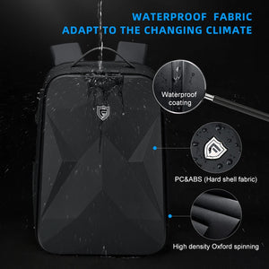Black hardshell backpack with a moulded front panel and an external USB port