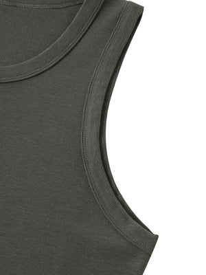 Close-up of the armhole, finished with a ribbed binding stitched flat around the edge