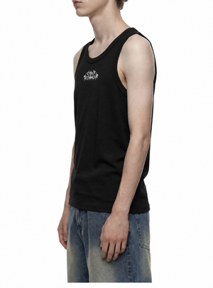 Side view on the model, the armhole binding sitting flat against the upper arm