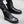 Pair of all Black high top boots worn with joggers, side zip and black laces, three-quarter view