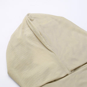 Close-up of the large hood of the khaki mesh dress laid flat, showing the soft stretch fabric and seam