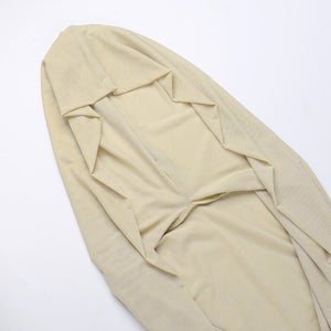 Inside view of the hood and cut-out neckline of the khaki maxi dress, with the pointed ruffle edging