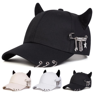 Black baseball cap with devil horns and metal rings on the brim