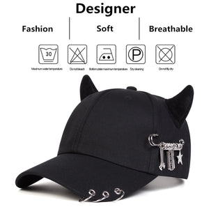 Black baseball cap with devil horns and metal rings on the brim