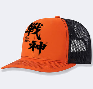 Orange Kanji Mesh Trucker Hat with black mesh panels, three-quarter side view of the black print