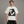 Man wearing the Kissing Graphic Y2K Shirts with black trousers, front view of the oversized fit and print