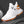 Knit Mesh Techwear Sneakers in White, three-quarter view with orange stripes and orange outsole