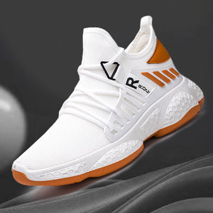 Knit Mesh Techwear Sneakers in White, three-quarter view with orange stripes and orange outsole