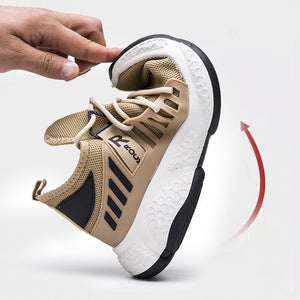 Hand bending a Khaki knit mesh sneaker, showing the flexible textured white sole